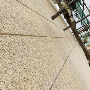 曲靖 黄金麻花岗岩荔枝面外墙干挂石材效果示例