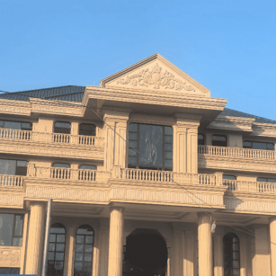 曲靖黄金麻别墅外墙干挂石材效果示例